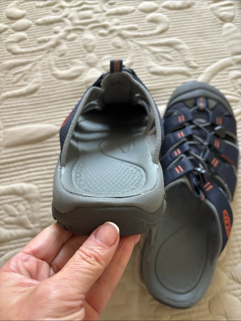Keen Men's Closed-Toe Slide Sandals in Black with Orange Accents